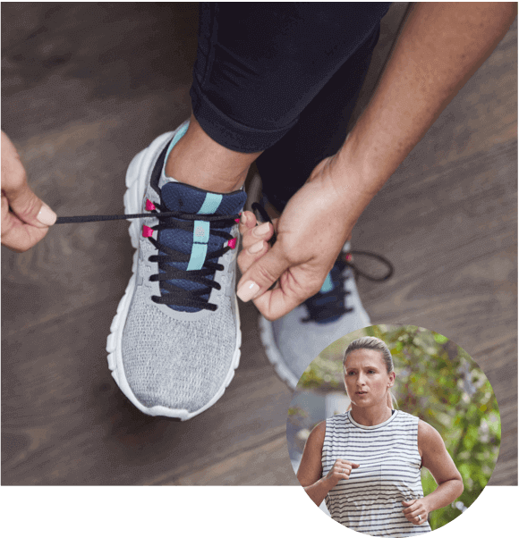 Woman Tying Shoes to go on a run