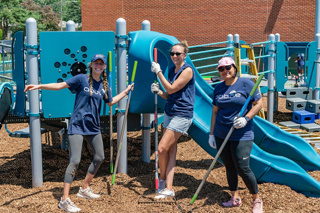 employees volunteering at a local school