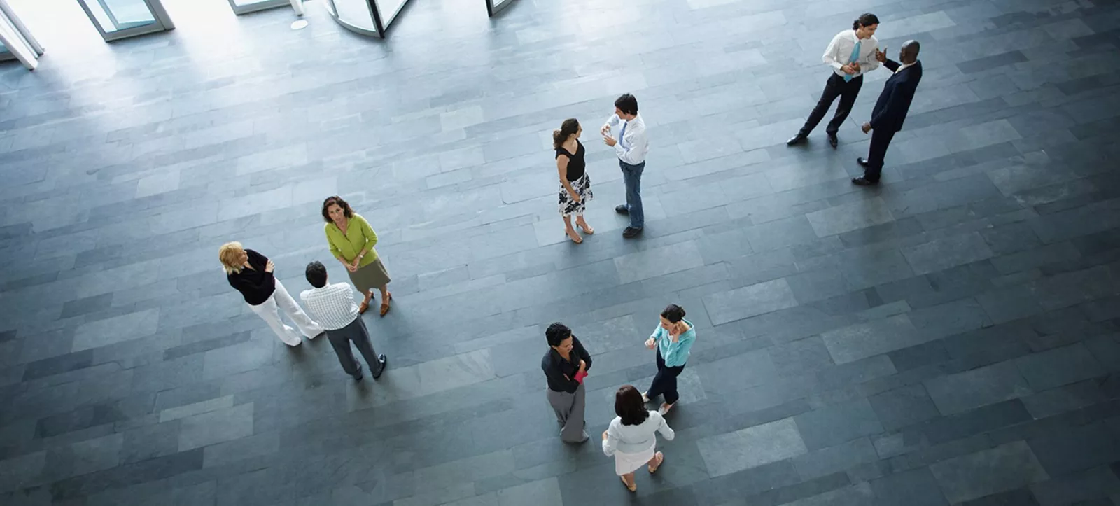 Birds eye view of employees in an AbbVie lobby. 