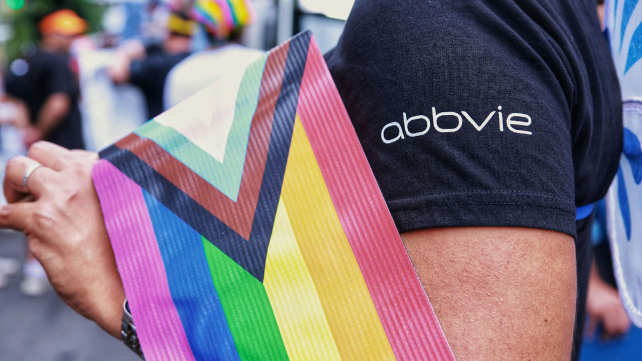 Employee with pride flag