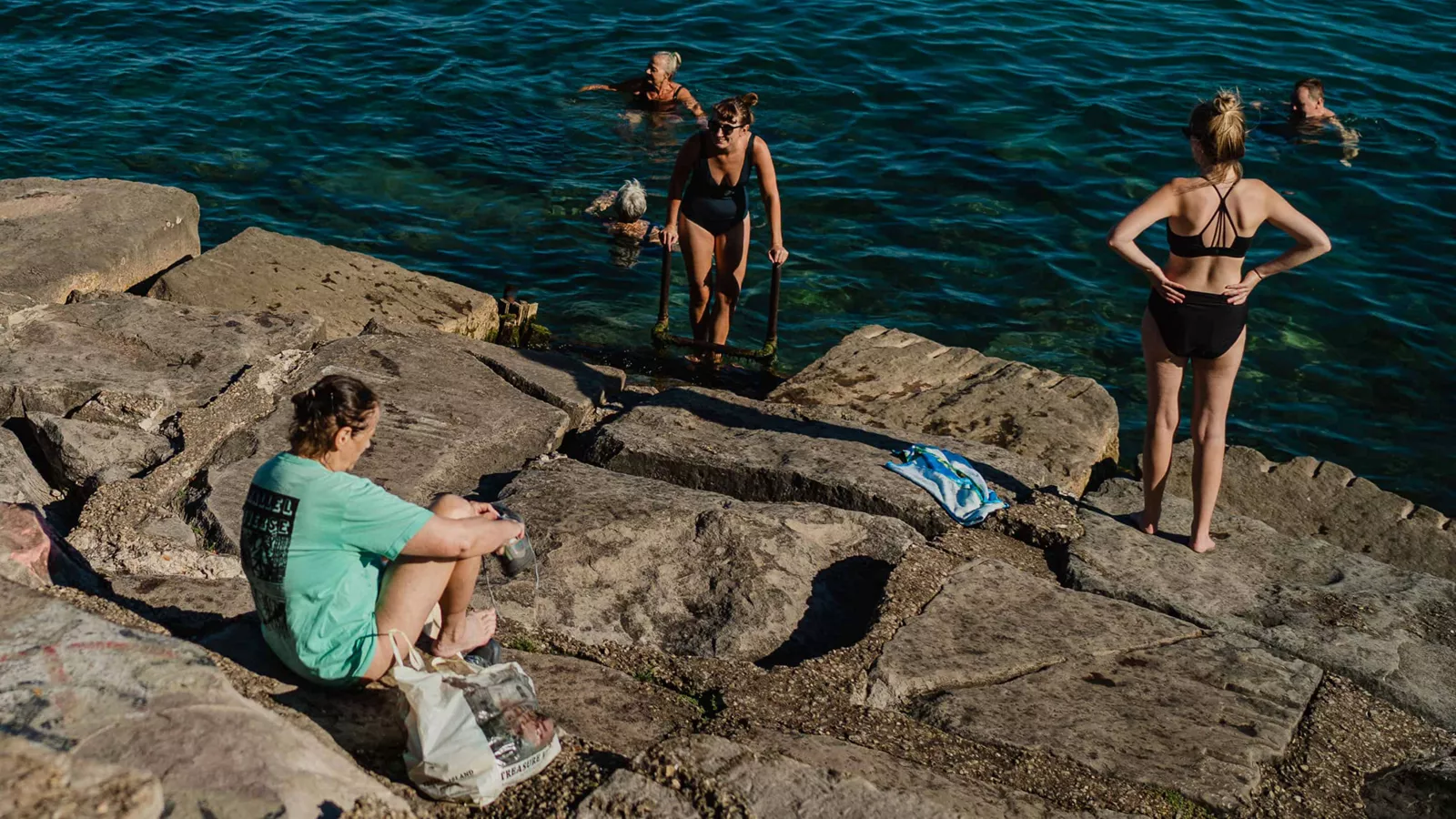 group of peope in lake