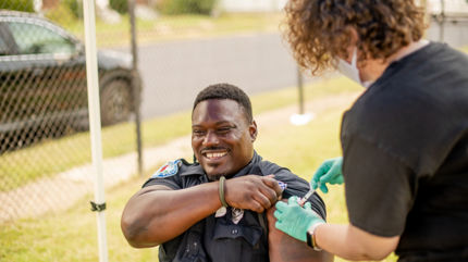 man getting vaccine