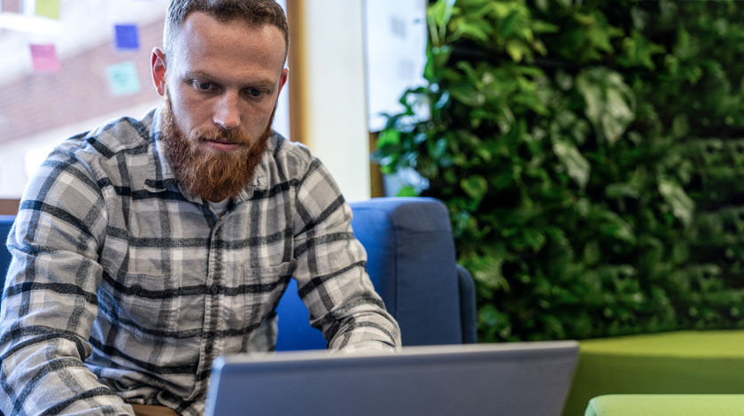 man in front of computer