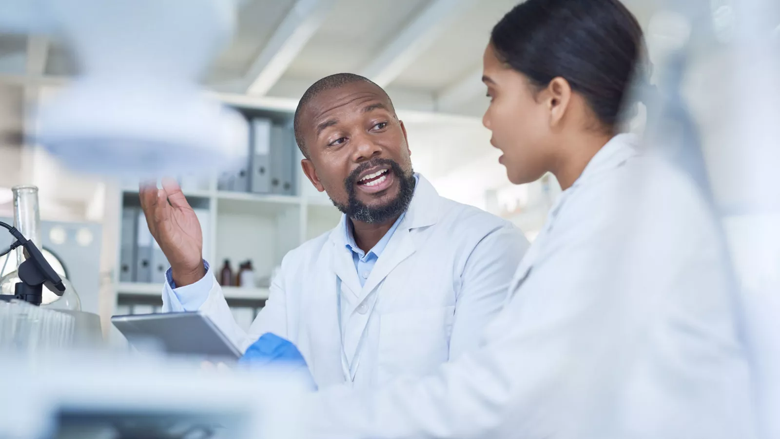 Scientists with white lab coats
