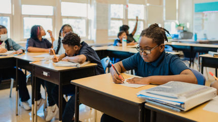 student at desk working