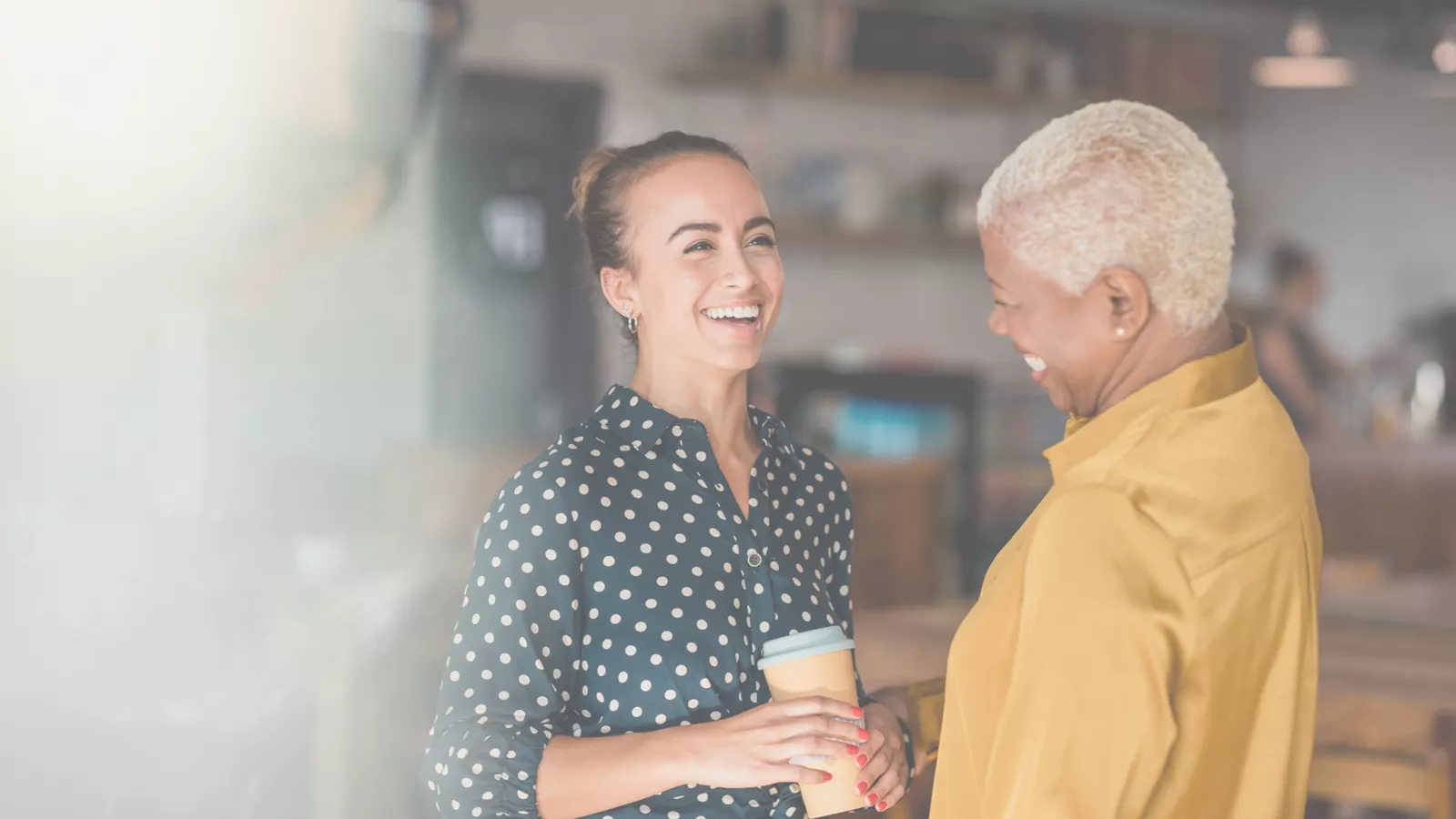  Two women interacting and talking