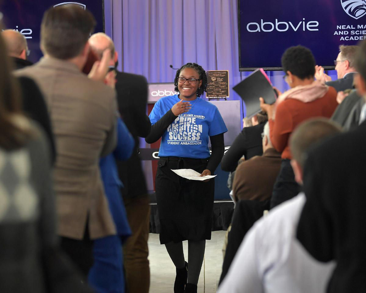 student speaking in crowd