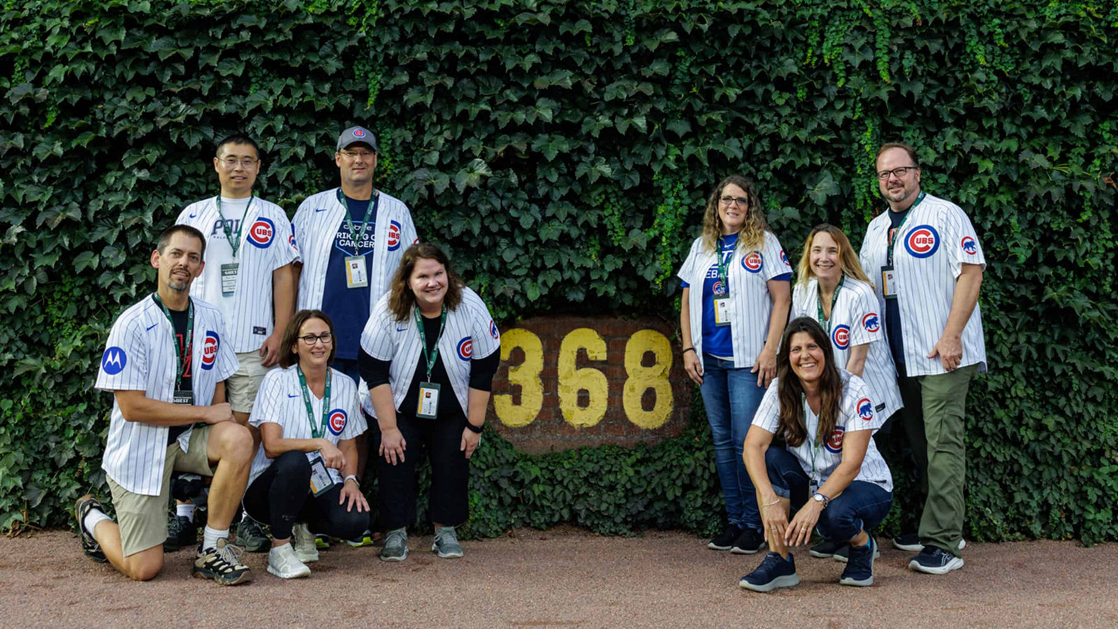 a group of people in a baseball field