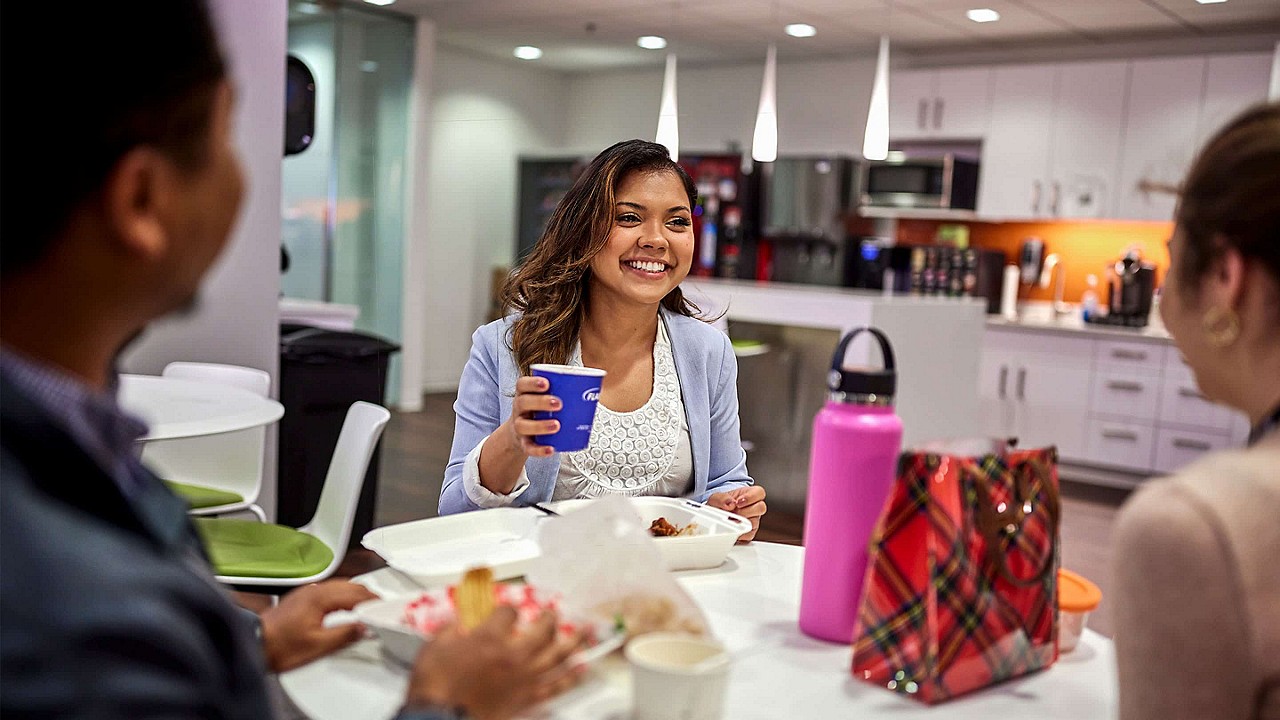 woman holding a coffee cup