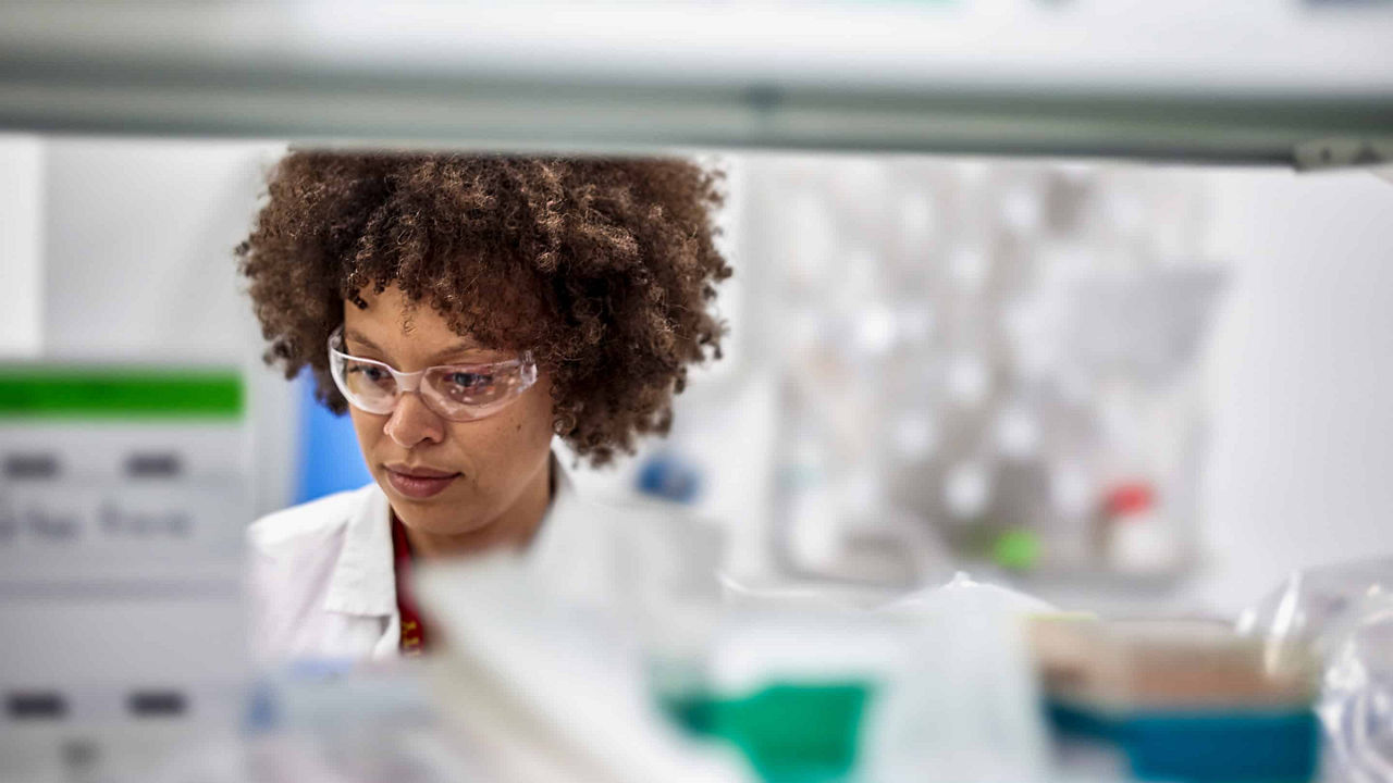 woman scientist looking down