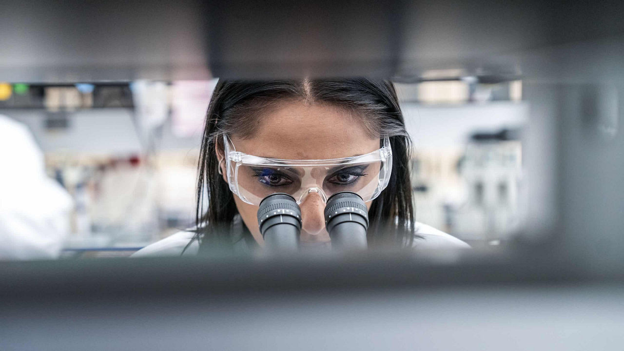 woman scientist microscope